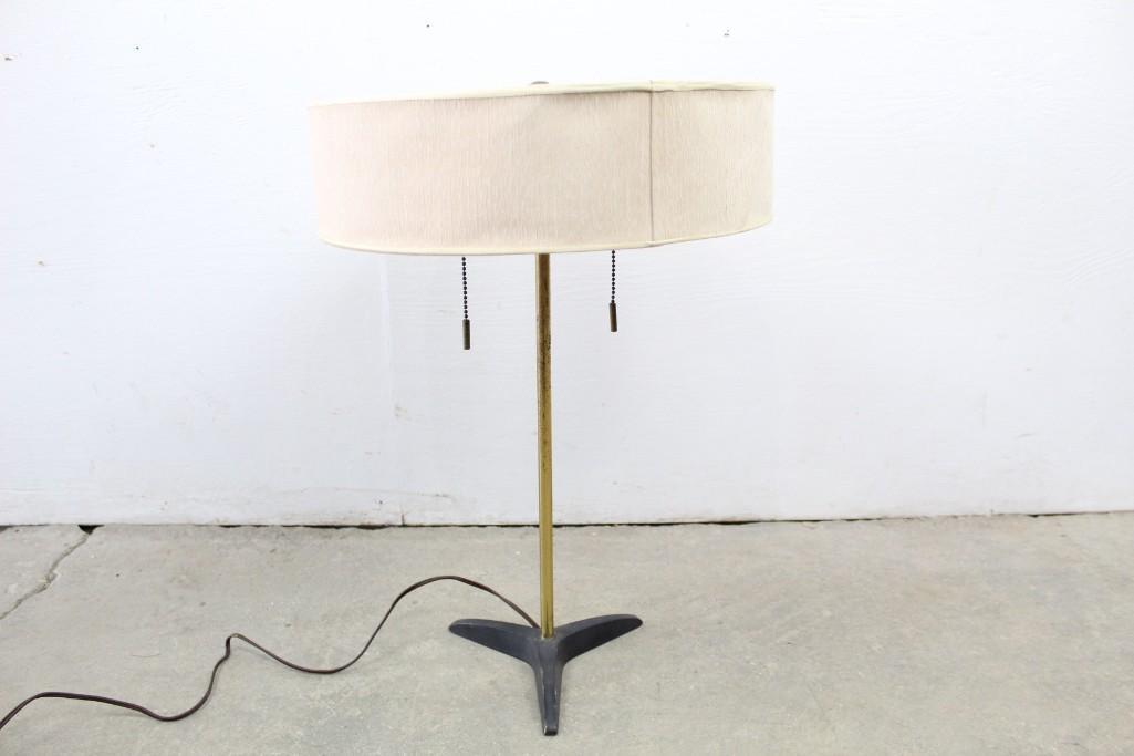 Gerald Thurston Stiffel Mid-century Modern Brass Lamp: Gerald Thurston Stiffel Mid-century Modern Table Lamp with Tripod Base. Designed by Gerald Thurston and marked as manufactured by Stiffel, this striking lamp will brighten the darkest corner of your m