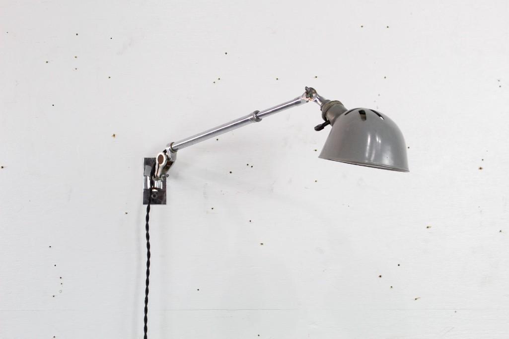 Industrial OC White Wall Factory Chrome Lamp Light: Industrial OC White Wall Factory Chrome Task Lamp. Chrome with a gray enameled shade, this adjustible light is wall mounted and articulated at the shade and base to allow the light to be precisely pos