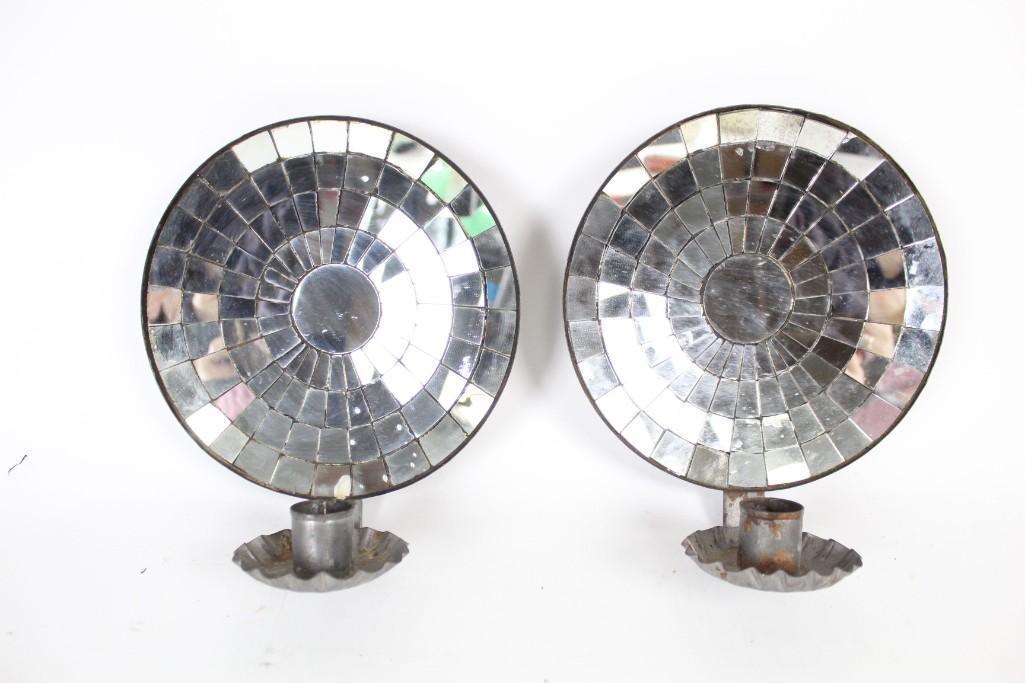 Pair of Round Metal Mirrored Wall Candle Sconces: Pair of Round Metal Mirrored Wall Candle Sconces. Candles sit in a wavy petal like sconce and reflect into the room with the help many small mirrors. They are delightful and resemble the headlights of