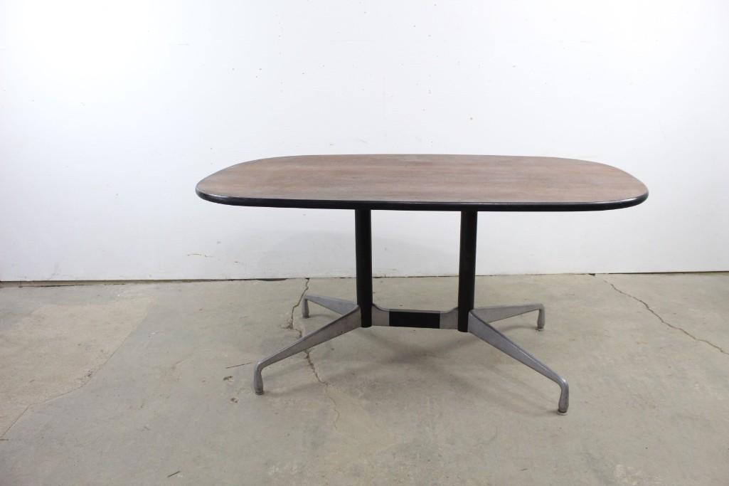 Mid-century Modern Herman Miller Aluminum Group Table: Mid-century Modern Herman Miller Aluminum Group Table. Featuring a classic design, this mid-century staple employs metal & wood to create an unforgettable piece for any room. The dimensions are 29 in 