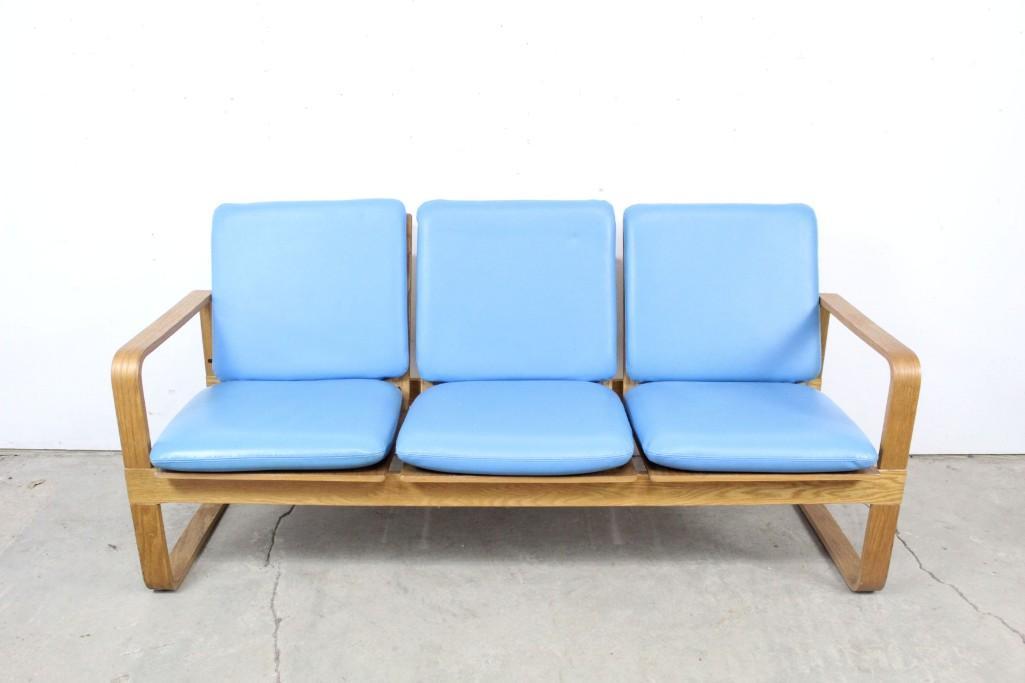 Mid-century Thonet Bent Plywood Couch Sofa Blue Cushion: Mid-century modern bent plywood three-seat sofa with vinyl cushions in a popping yet comforting baby blue color. Made by iconic brand Thonet. This piece is in remarkable condition for its age, and wou