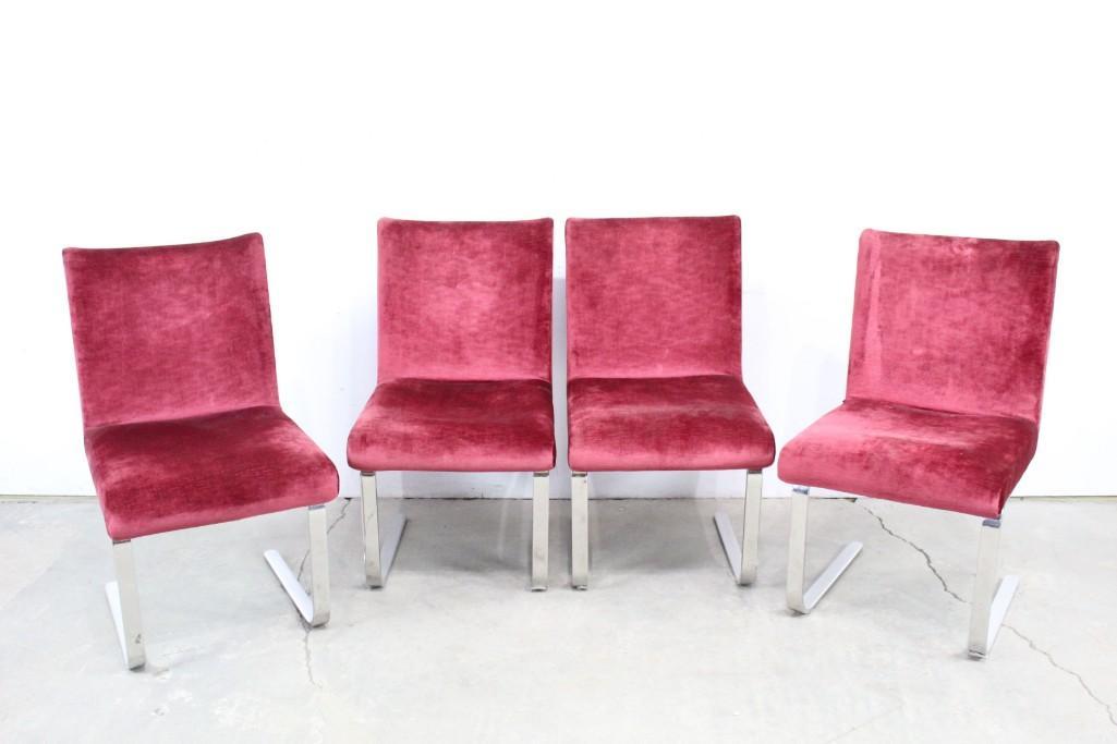 Mid-century Pop Red Velvet and Chrome Chairs, Set of 4: Set of four Mid-century modern chairs in luscious red velvet on shiny bent chrome bases, straddling the line between minimalist and pop art aesthetics. The way light plays off velvet fabric really giv