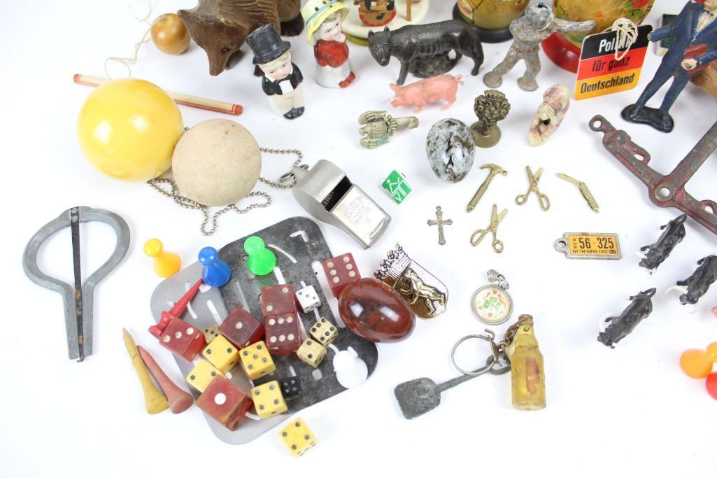Mixed Small Toy Lot Marbles Iron Matrushka Dolls Dice: Mixed Small Toy Lot, Marbles, Cast Iron, Nesting Dolls, Dice, kaleidoscope, tops, charms and many others. Fun assortment of small toys that will be a great addition to your toy collection. The dimensi