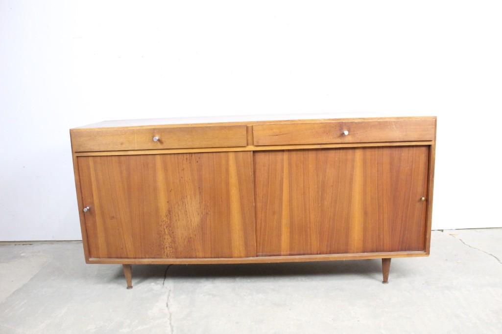 Mid-century Modern Wood Sliding Door Credenza & Drawers: Mid-century Modern Wood Sliding Door Credenza & Drawers. This stylish Mid-century Modern credenza will look great in your home. The light wood has a beautiful pattern. This piece has lots of room for 