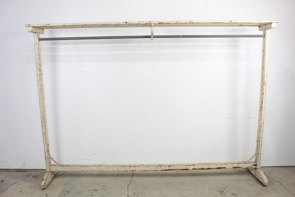 Industrial White Painted 8-foot Factory Clothing Rack: Industrial rustic white painted factory clothing rack. This cool industrial clothing rack is just the thing if you have too many hanging clothes and not enough storage space. It could also be a great