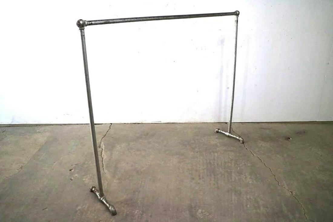 Antique Industrial Metal Pipe Clothing Straight Rack: Industrial Minimalist Metal Pipe Display Clothing Rack. This rectangular clothing rack is made of joined pipes to create an industrial yet minimal feel that is slim fitting and perfect for any bedroom