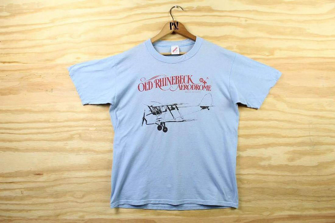 Blue M Old Rhinebeck Aerodrome Vintage Biplane T-Shirt: SHIPPING: We will ship this item in-house, for a $12 flat rate to the Continental US; $2 for each additional shirt. Please contact us for a shipping quote on larger quantities. Blue M Old Rhinebeck Ae