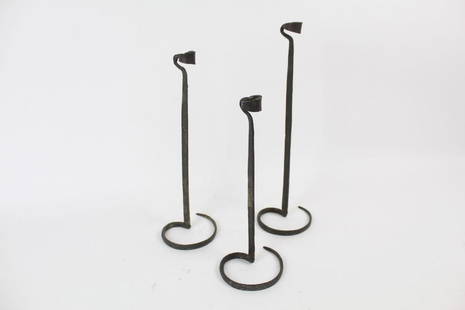 Antique Set 3 Bronze Candle Sticks,Hammered,Dif Lengths: Antique Set 3 Bronze Candle Sticks,Hammered,Dif Lengths. We have held a magnet to the candlesticks, it did not stick. It is our determination that these are either Bronze. They are nesting and fit