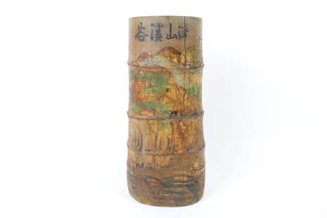 Carved Asian Bamboo Brush Pot Featuring Landscape Image: Carved Asian Bamboo Brush Pot featuring landscape imagery in green, red, brown, and blue. This piece would do well as a centerpiece or on display on a shelf. Dimensions are 13.75 in h x 6.25 in w x