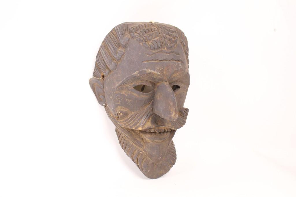 Antique Carved Wooden Face,Man & Mustache,Mask: Hand carved dark wooden face wall hanging, featuring a beard & smirking expression. This piece would look great in a bar or study space. Dimensions are 10.25 in h x 7.5 in w x 6 in d. Condition is goo