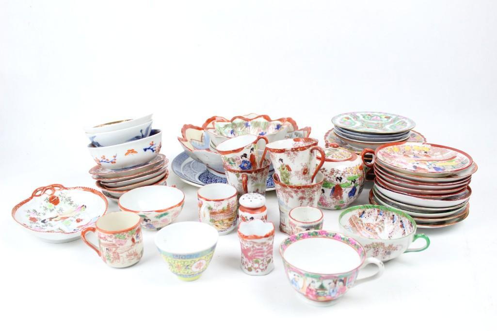 Japanese Tea Cup and Plate Set with Intricate Drawings (1 of 14)