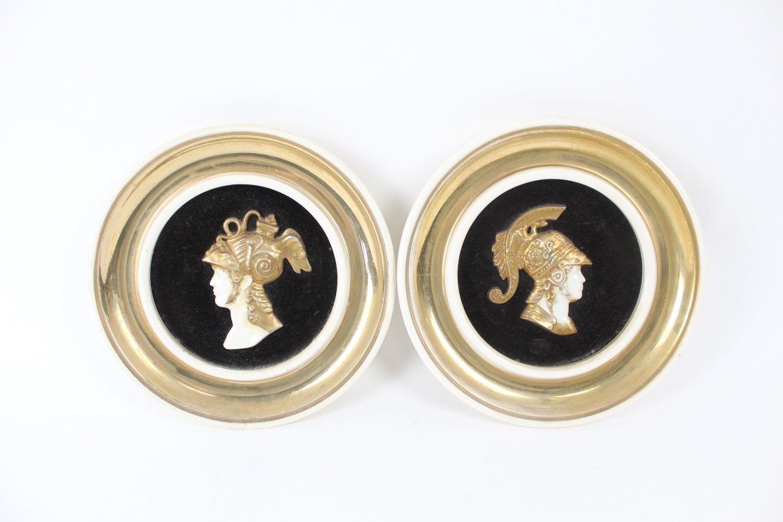 Pair of Decorative Hanging Plates, Roman Soldiers, Gold: Pair of Decorative Hanging Plates, with the profiles of Roman Soldiers. Ceramic base, with black velvet set around the profiles, and a border of gold. Metal rings attached to the backs for hanging.Dim