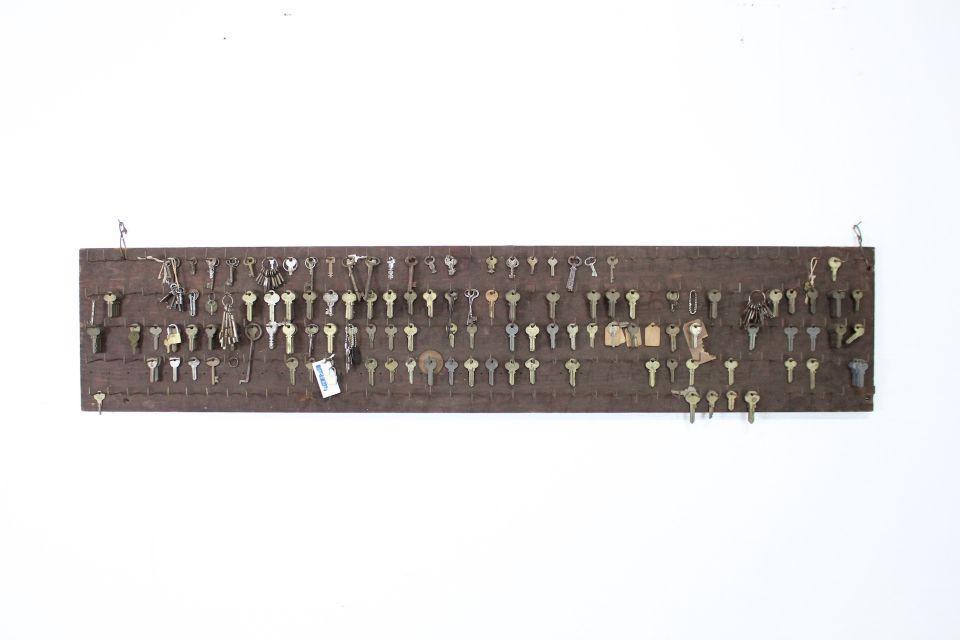 Locksmith Blank Key Hooks Wood Board Filled w/ Keys: Wooden Locksmith Blank Key Board w/ Dozens of Keys. Keys are in a variety of profiles and shapes, giving the impression of a collection. Dimensions of board are 12.5 in h x 62 in w x 3.5 in d. Conditi