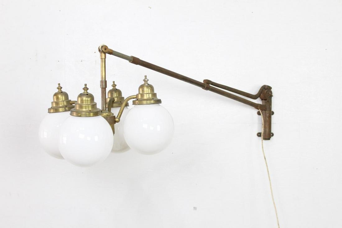 Antique Articulated Arm Dental Lamp w/Milk Glass Globes: Antique Articulated Arm Dental Lamp w/Milk Glass Globes. Hinged arm makes this piece adjustable as well as pivots. Wall mount and arm are steel. This fabulously unique piece would be very cool and unu