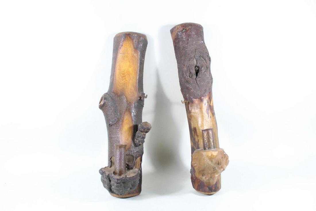 Pair Wood Natural Log Wall Candleholder,Adirondack Camp: Pair of Wooden + Metal Natural Branch Wall Candleholders. Each holder is a branch, oriented vertically, with a hammered metal candle holder attached near the base. Each has a tiny hook attached to