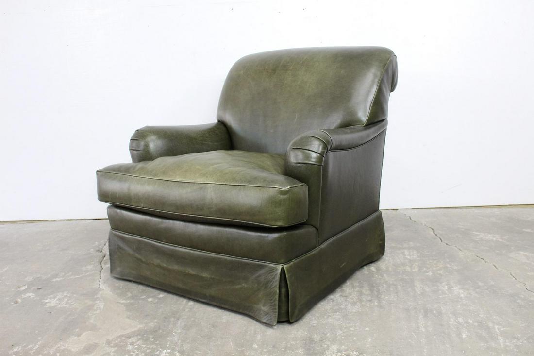 Juan Pablo Molyneux Green Leather Club Lounge Armchair: Juan Pablo Molyneux Green Leather Club Lounge Chair. It has a plush seat and back, two armrests, and feet hidden beneath the skirt. The green leather has a great patina on it. There is a label under t