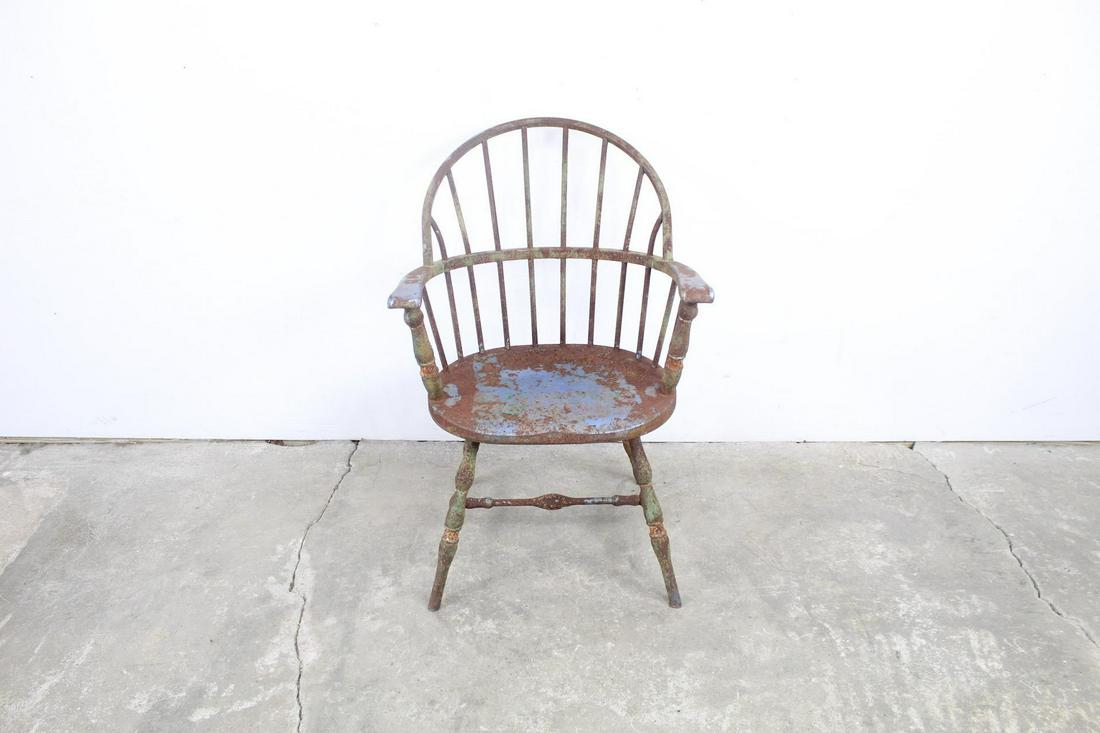Industrial Painted Steel Windsor Barrel Dining Chair: Industrial Painted Steel Windsor Barrel Dining Chair. It is steel with hints of blue, green, and silver paint still remaining. It has the classic curved barrel shape, with armrests and legs made to lo