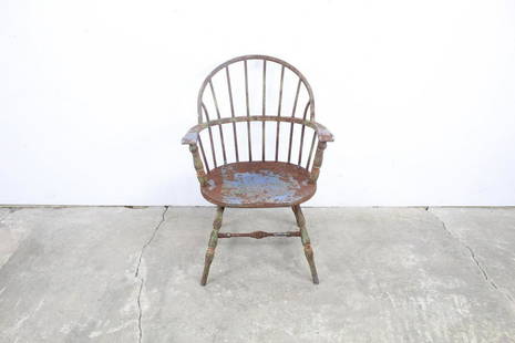 Industrial Painted Steel Windsor Barrel Dining Chair: Industrial Painted Steel Windsor Barrel Dining Chair. It is steel with hints of blue, green, and silver paint still remaining. It has the classic curved barrel shape, with armrests and legs made to