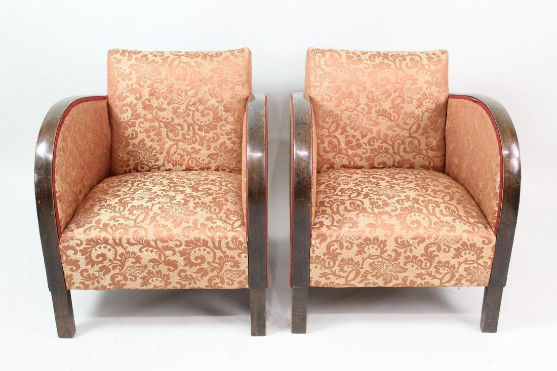 Pair of European Art Deco Bentwood Veneer Arm Chairs: Pair of European Art Deco Bentwood Veneer Arm Chairs. This pair of streamline Art Deco armchairs have Bentwood veneer arms, rust-colored floral upholstery, and red trim along the edges. We believe the