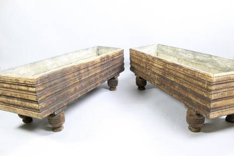 Pair Wooden Zinc Lined Footed Planter Boxes,Jardinieres: Pair Wooden Zinc Lined Footed Planter Boxes,Jardinieres. This pair of planter boxes features beautifully turned legs and a carved exterior with great patina. One of the short ends on each box is