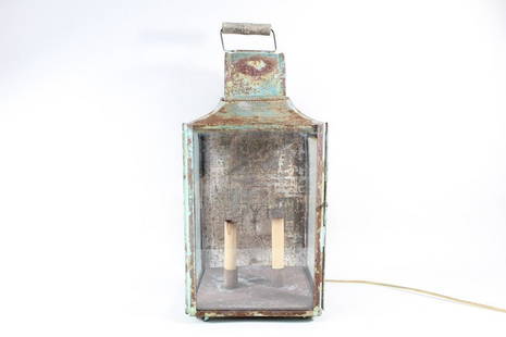 Antique Patinated Green Tin Electric Lantern w/ Candles: Antique Patinated Green Tin Electric Lantern w/ Candles. This is a charming electric lantern. It has three glass panes, and opens from the side rather than the front. Inside the lantern, there are