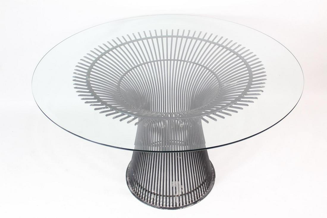 Warren Platner Knoll Round Glass Top Dining Table: Warren Platner Knoll Round Glass Top Dining Table. This table, designed by Warren Platner for Knoll, has a sleek and distinctive design. It has a rounded metal base that curves up and outwards to meet