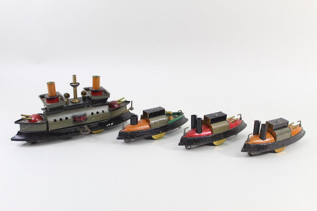 Hess German Windup Clockwork Tin Toy 4 Boats Flotilla: Hess German Tin Toy 4-Boat Flotilla Gunship Steamboats. This set of tin boats probably would have originally been packaged as a kind of flotilla, with the larger gunship leading the three smaller wars