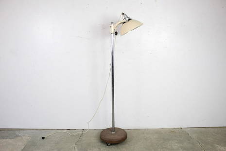 Modern Industrial Dentist Office Floor Lamp Light: Modern Industrial Dentist Office Floor Lamp Light. This is an industrial dentist's office floor lamp from Wilmot Castle Company, a manufacturer of medical and dental equipment. The tan light has a han