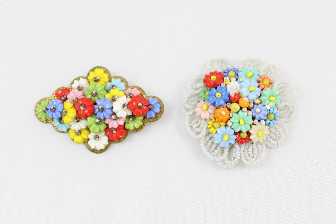 Pair of Vintage Floral Beaded Brooches, Haskell Style: Pair of Vintage Floral Beaded Brooches Adorable pins reminiscent of Miriam Haskell style both feature colorful floral glass beads in red, blue, white, yellow, green & blue. One is round, with a white 