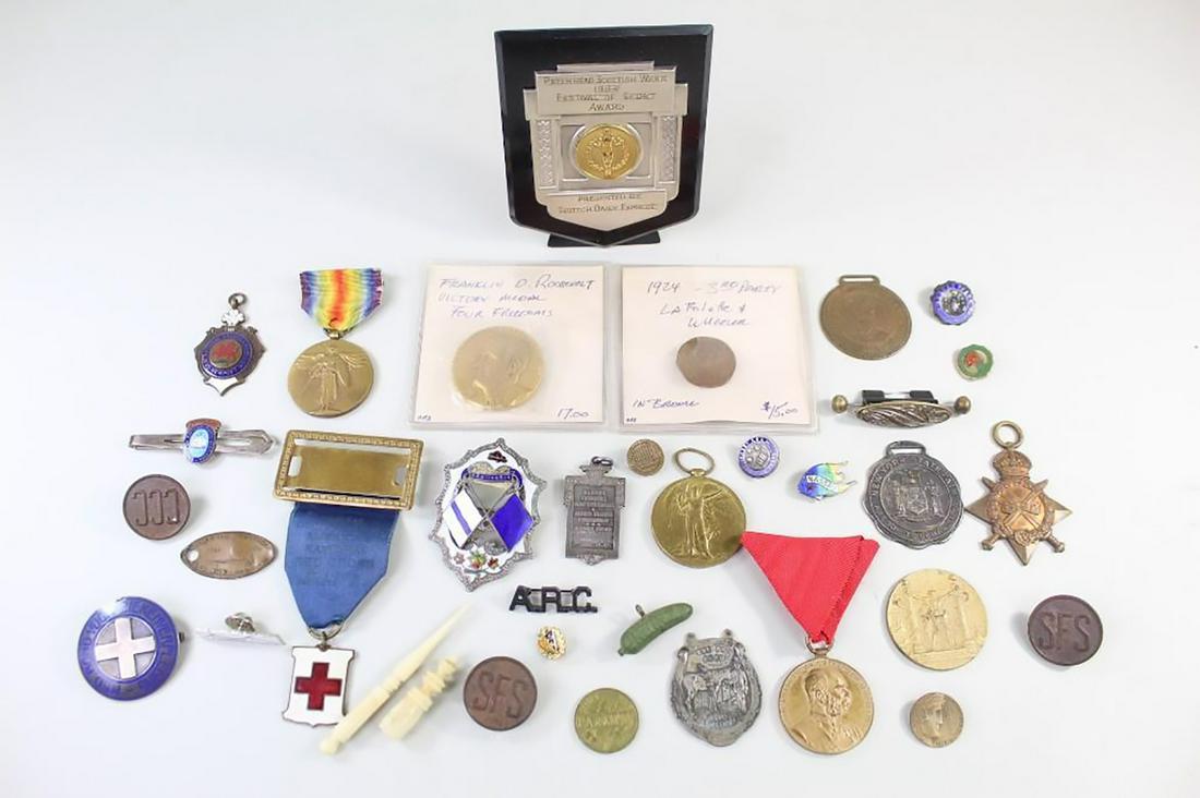 36 Piece Collection Vintage Medals, Pins, Charms &More: 36 Piece Collection Vintage Medals, Coins, Charms & More. Diverse and fascinating lot includes a WWI medal, a Detroit Spelling Bee Champion pin, a baking medal, a Heinz pickle charm, a Red Cross medal