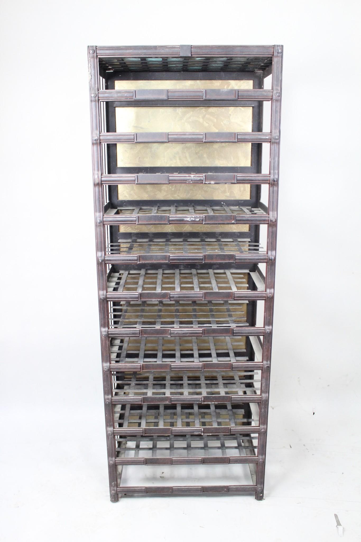 Industrial Steel 6-ft Tall Wine Rack Shelf, 4 of 4: Industrial Steel 6-ft Freestanding Wine Rack, 4 of 4. This solid, sturdy metal wine rack, made of welded and riveted steel in a handsome dark brown matte finish, has a gold-painted sheet metal backing