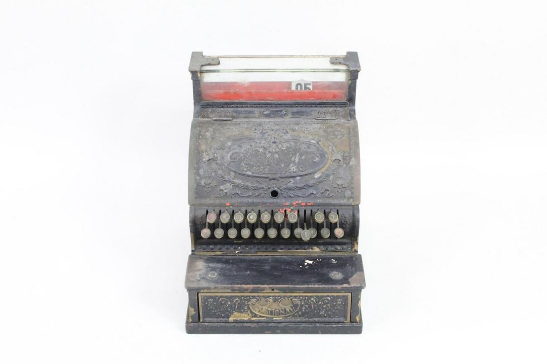 Antique Cast Bronze National Cash Register: Antique Cast Bronze National Cash Register. An antique cash register from the "National Cash Register Co." Made in cast metal, possibly bronze, and painted black with beautiful cast Fleur-de-lis motif