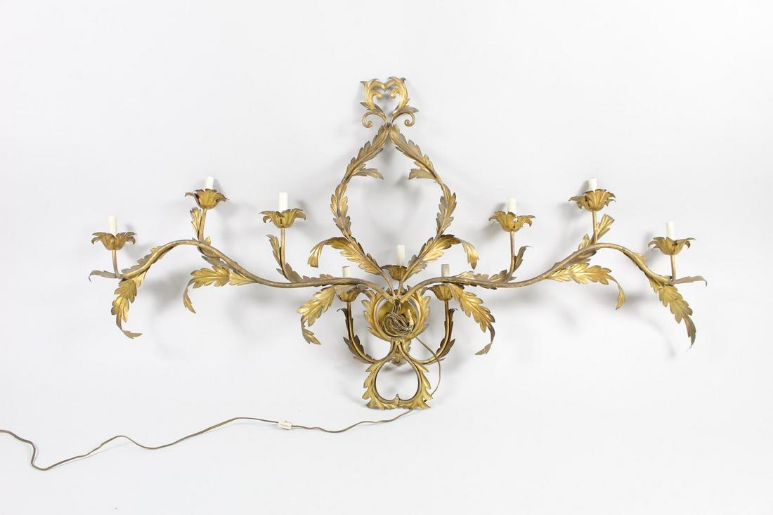 5-ft Foliate Gilt 9-Lite Candelabra Electric Sconce: 5-ft Foliate Gilt 9-Lite Candelabra Electric Sconce. This fantastic sconce has an impressive 5-foot wingspan and a total of 9 sockets for bulbs. Gilt metal, probably bronze. Leafy laurel-like foliage 