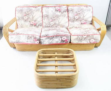 Mid Century Modern Frankl Style Rattan Couch & Ottoman: Paul Frankl Style Rattan Pretzel 3 Seat Couch & Ottoman. Attractive couch is made of bamboo and has pretzel arms and a stacked base, in the manner of Paul Frankl. Matching ottoman is square with