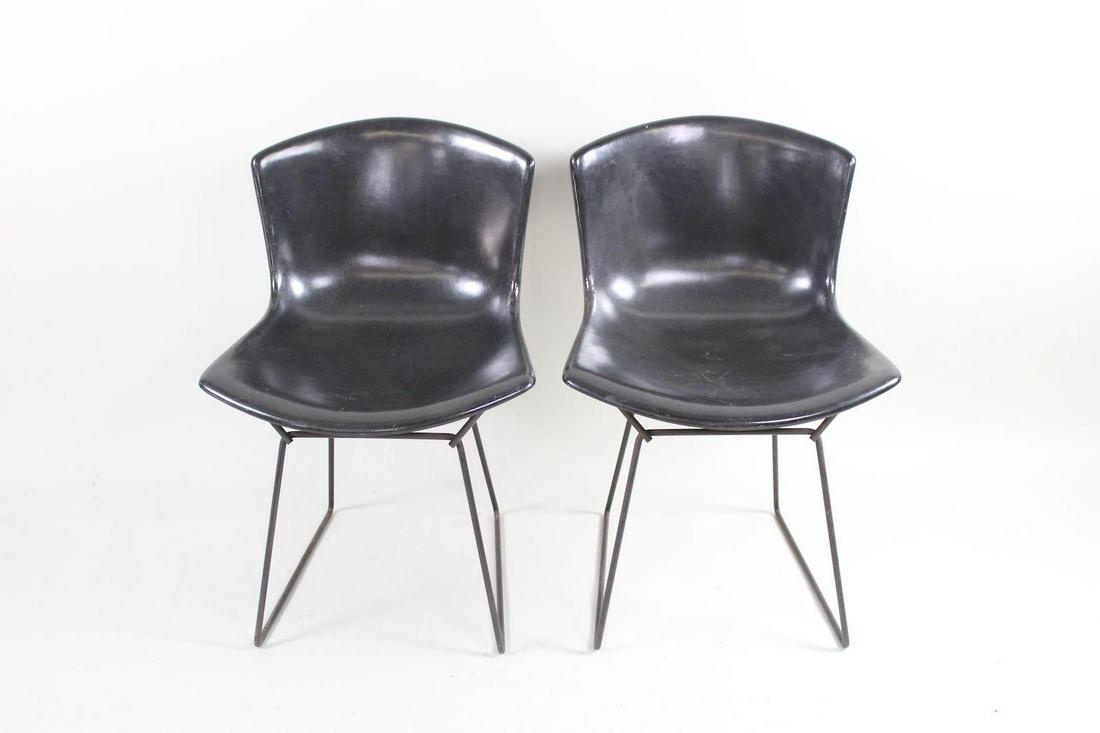 Pair of Black Bertoia for Knoll Fiberglass Chairs: Pair of Black Bertoia for Knoll Fiberglass Chairs. Top surface appears polished to a black sheen, with metal legs painted black to match. A class Bertoia shape which recalls classic Mid-Century era de