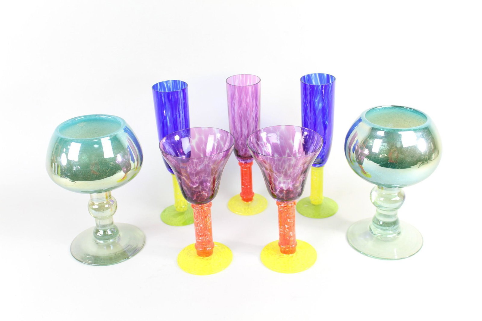 Lot of 7 Bohemian Stemmed Art Glass,Flutes,Wine,Murano: Lot of 7 Bohemian Stemmed Art Glass,Flutes,Goblets,Wine. Colorful group of handcrafted beverage glasses includes 3 multicolor champagne flutes, 2 purple, yellow & red wine glasses, and 2 large lig