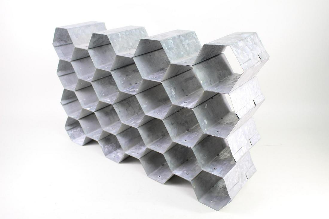 Industrial Galvanized Metal Honeycomb Wine Rack Shelf: Industrial Galvanized Metal Honeycomb Wine Rack Shelf. A small wine rack in a honey comb design made in galvanized metal. Twenty five compartments in total.Great design on its own or to store wine or 