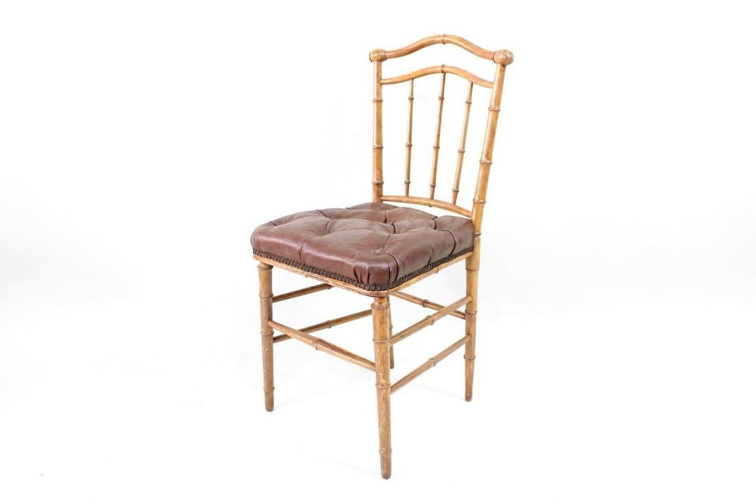 Faux Bamboo Chiavari Side Chair w/Tufted Leather Seat: Faux Bamboo Chiavari Side Chair w/Tufted Leather Seat. Pretty and elegant chair has a faux bamboo wooden frame with a brown tufted leather seat. Wonderful chair for dining or perhaps your dressing roo