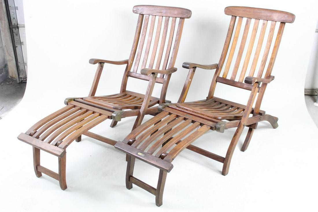 Pair SS New Amsterdam 1st Class Deck Chair Recliners: Pair SS New Amsterdam 1st Class Deck Chair Recliners. Wonderful lot with a pair of folding deck lounge chairs from ocean liner SS New Amsterdam. Made in teak with brass hardware and plaques reading "1