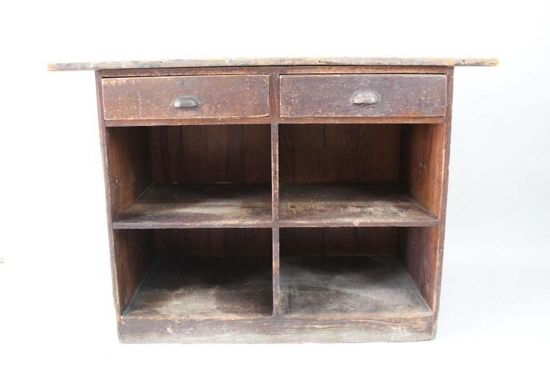 Industrial Work Bench Counter Artist Mihail Chemiakin: Industrial Wooden Work Table or General Store Counter. Wooden work table or counter, previously used in an artist studio as a work bench. Two top drawers with half moon metal handles and four shelves