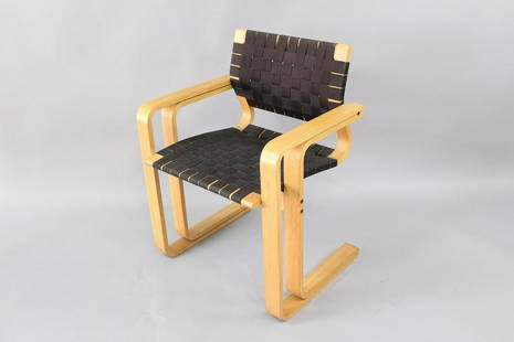 Danish Mid-Century Modern Thygesen Sorensen Bent Chair: Danish Mid-Century Modern Thygesen Sorensen Bent Chair. This is a beautiful bent wood armchair designed by, Rud Thygesen and Johnny Sorensen. It has a black canvas weaved seat and back. Tag on bottom