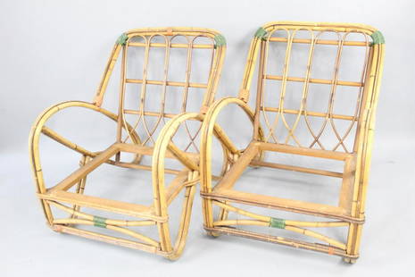 Pair of Mid-Century Modern Bamboo Pretzel Lounge Chairs: Pair of Mid-Century Modern Bamboo Pretsel Lounge Chairs. Great set of chairs in bent bamboo and rattan attributed to Paul Frankl. Looped "pretsel" sides and green and red painted woven details makes t