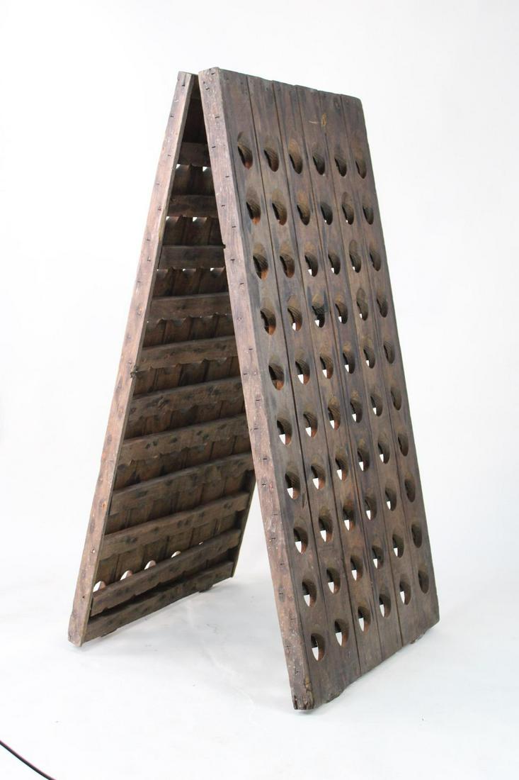 Large French Style Wood A-Frame Wine Riddling Rack: Large French Style Wood A-Frame Wine Riddling Rack. Heavy, freestanding A-frame rack is made of oak, and folds flat for storage. Large 120-bottle capacity makes it ideal for a wine shop or restaurant.