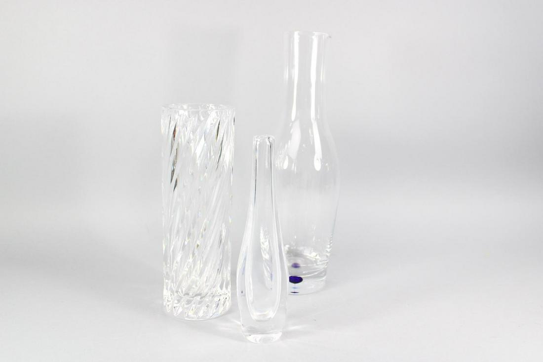 Lot of 3 Scandinavian Modern Orrefors Swedish Art Glass: Lot of 3 Scandinavian Modern Orrefors Swedish Art Glass. Each piece is clear and signed Orrefors on the underside.Included are a textured vase signed Olle Alberius, a clear bud vase, and an Intermezzo