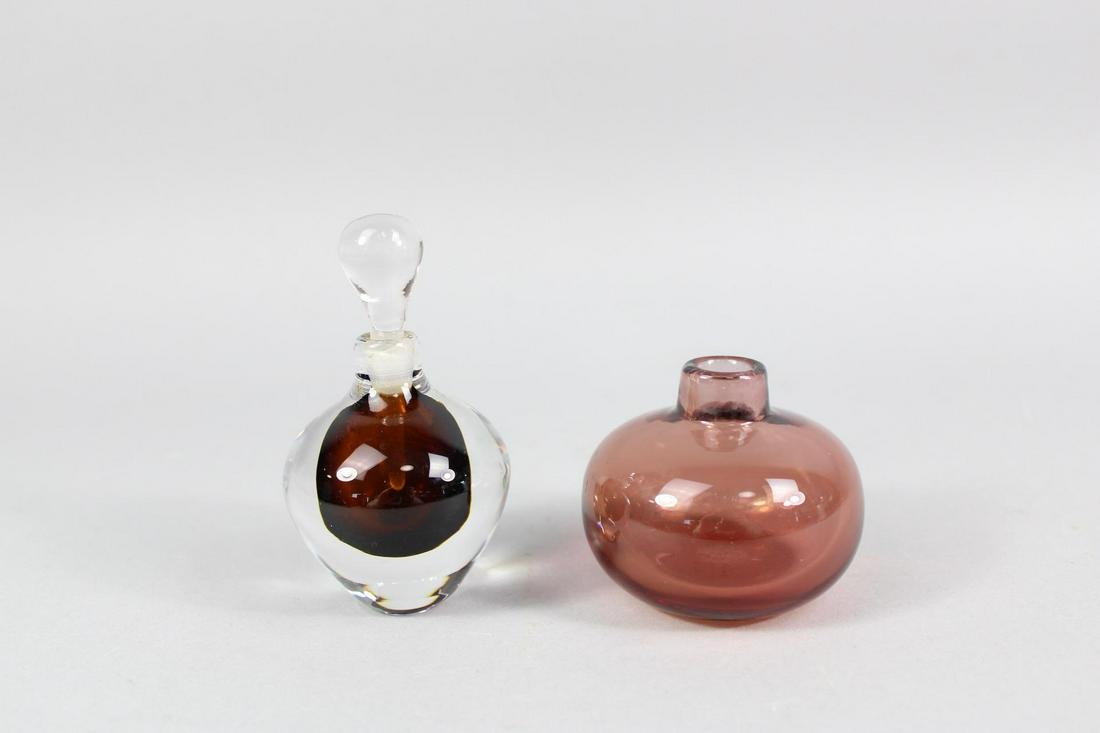 Lot of 2 Modern Swedish Art Glass, Orrefors & Kosta, Signed: Lot of 2 Modern Swedish Art Glass, Orrefors & Kosta, Signed. Included are a brown & clear perfume bottle with clear glass stopper, signed on the underside Kostaand the artist Mona Morales Schildt's si