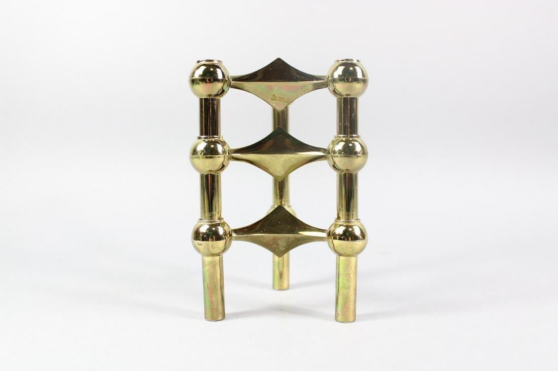 Boxed Set of Brass Caesar Stoffi Candle Holders for Nagel, Mid Century Modern: Boxed Set of Brass Caesar Stoffi Candle Holders for Nagel, Mid Century Modern. This set in shiny brass comes in it's original box. Original paper label on the one foot says Germany.Dimensions are 2.75