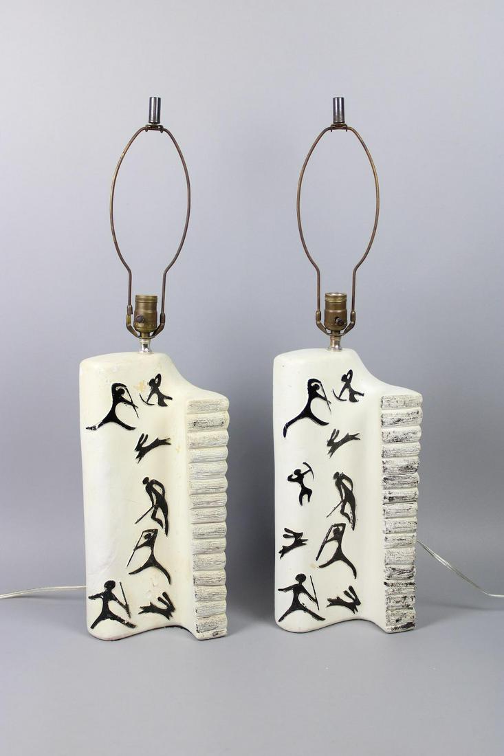 Pair of Chalkware Mid-Century Modern Lamps, Frederic Weinberg Style: Pair of Chalkware Mid-Century Modern Lamps, attr. Frederic Weinberg. Fabulous matching pair of lamps are made of white chalkware, decorated with black figures hunting rabbits, reminiscent of cave pain