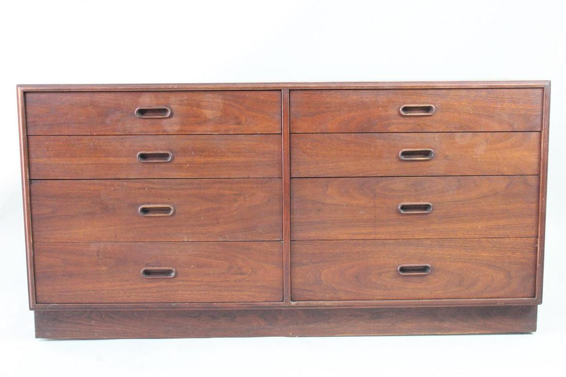Mid-Century Modern Jack Cartwright Style 8 Drawer Wooden Dresser: Mid-Century Modern Jack Cartwright Style 8 Drawer Dresser. Lots of storage space and oval cutout drawer pulls. Dimensions are 30.25 in h x 60 in w x 18 in d. Condition is good to fair with water spots