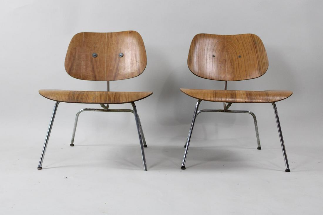 Pair of Eames LCM Plywood Lounge Chairs, as is: Pair of Eames LCM Chairs, as is. These chairs are missing the pads on the back of the seats and have been drilled through with bolts. Dimensions are 26.25 in h x 22 in w x 24 in d. Condition is fair.
