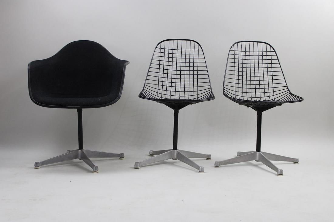 Lot of Eames Chairs, Pair Wire Chairs & Black Armchair for Herman Miller: Lot of Eames Chairs, Pair Wire Chairs & Black Armchair for Herman Miller. Great set of mid-century modern chairs includes 2 matching black wire chairs and a black molded fiberglass swivel armchair is 